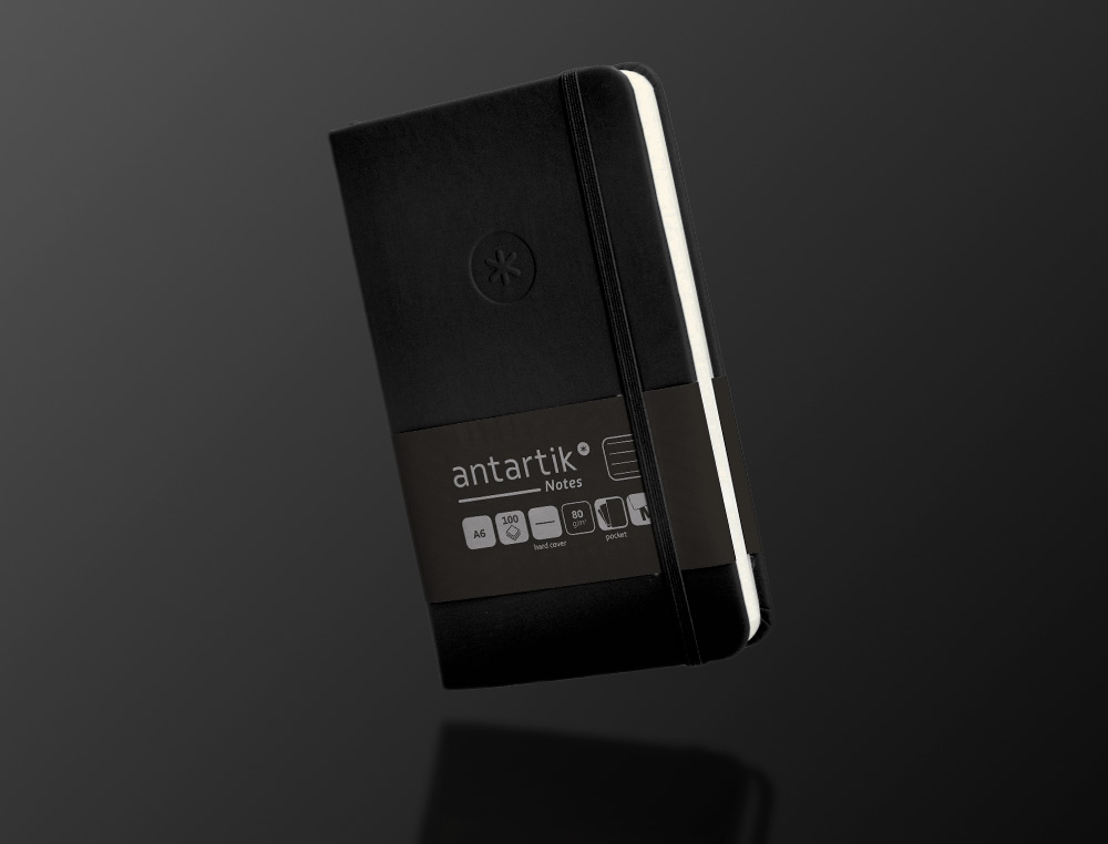 CARNET A6 ANTARTIK NOTES LIGNECOUVERTURE RIGIDE FERMETURE ELASTIQUE 100 PAGES 80GR COLORIS NOIR