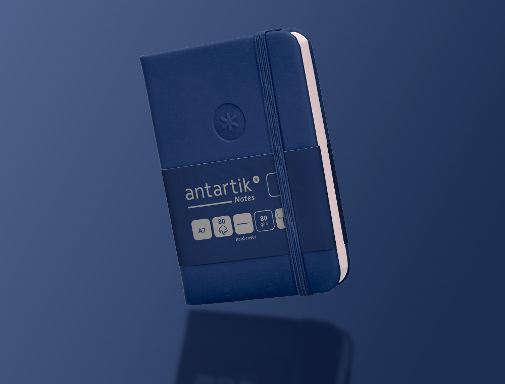 CARNET A7 ANTARTIK NOTES PAPIER UNI IVOIRE COUVERTURE  RIGIDE FERMETURE ELASTIQUE 80 PAGES 80GR COLORIS BLEU MARINE