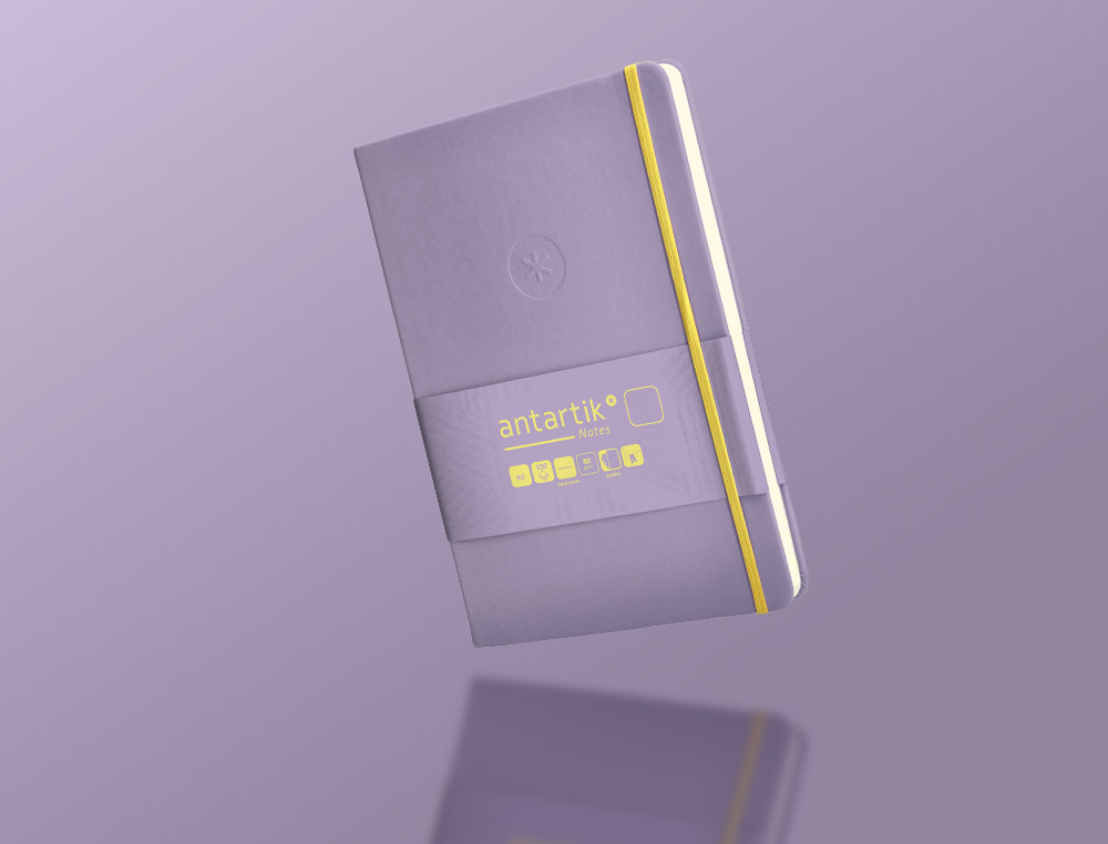 CARNET FERMETURE ELASTIQUE JAUNE ANTARTIK NOTES COUVERTURE RIGIDE A5 PAPIER UNI IVOIRE 100 FEUILLES 80GR FSC LILAS