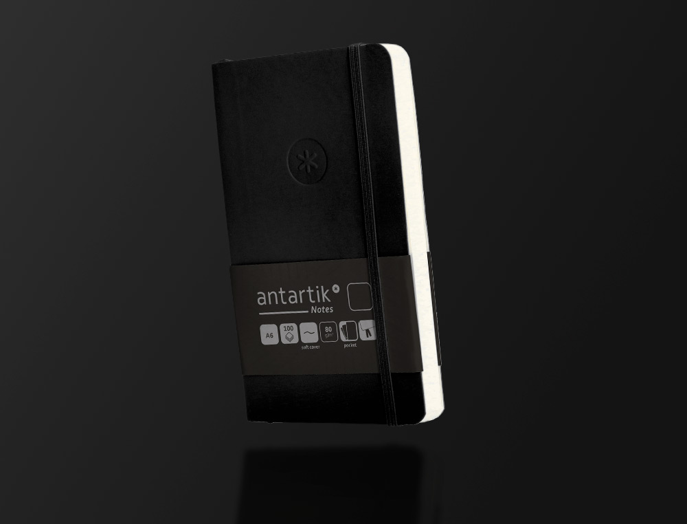 CARNET A6 ANTARTIK NOTES PAPIER UNI IVOIRE COUVERTURE SOUPLE FERMETURE ELASTIQUE 100PAGES 80GR COLORIS NOIR