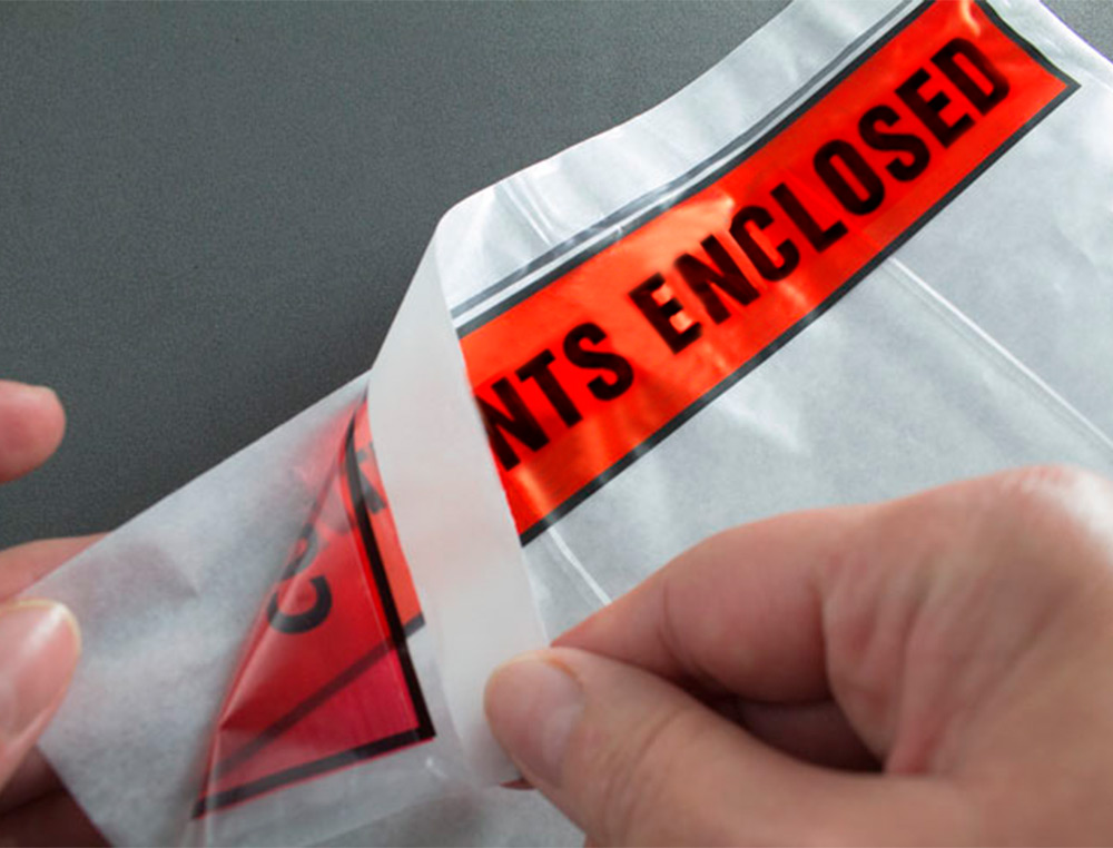 POCHETTE DOCUMENTS CI-INCLUS Q-CONNECT AUTO-ADHESIVE       TRANSPARENTE 225X165MM TEXTE  ANGLAIS PAQUET 100 UNITES